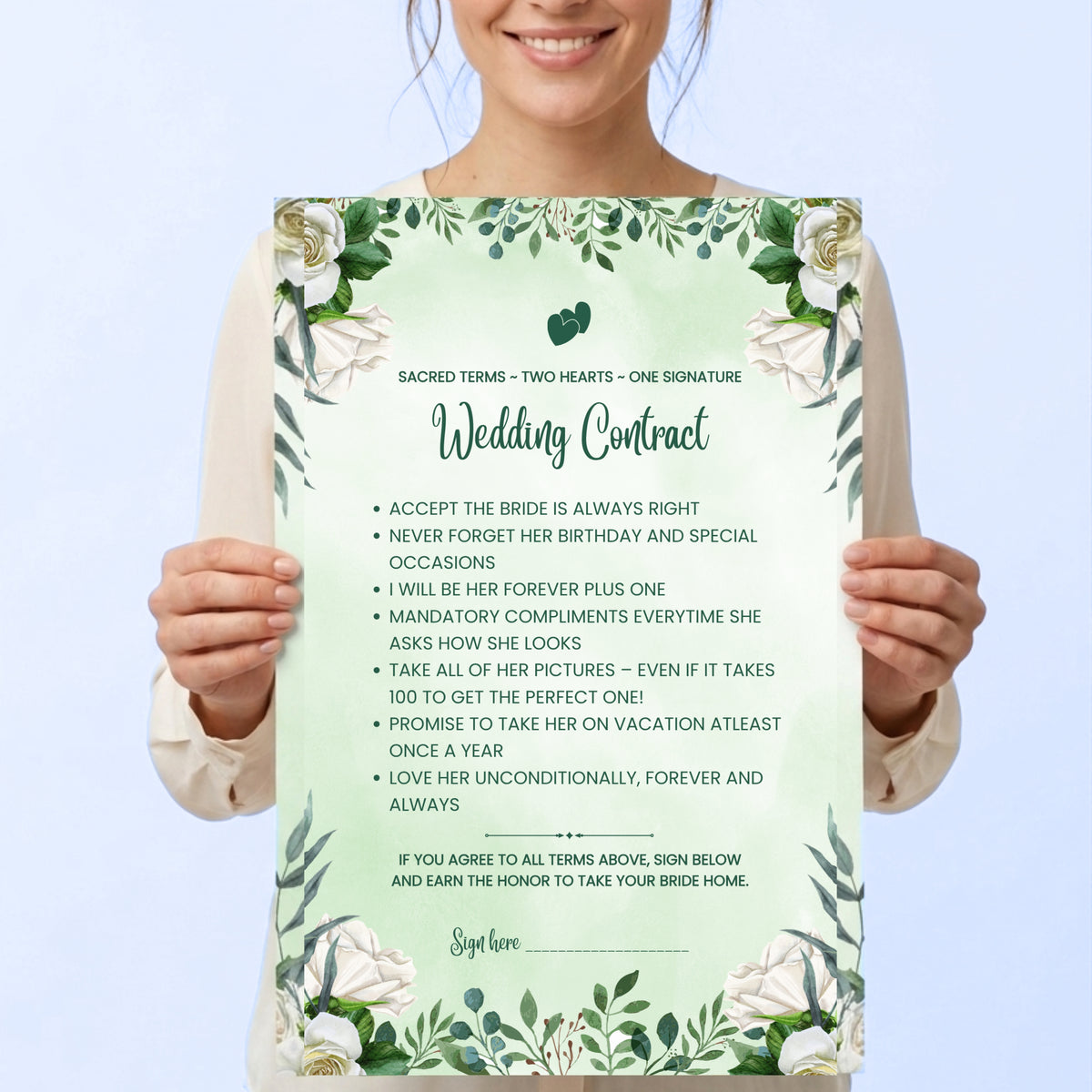 Woman holding personalised wedding contract board green floral — Gogirgit