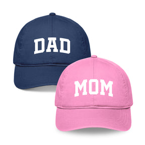 Navy blue cap with 'DAD' and pink cap with 'MOM' gogirgit